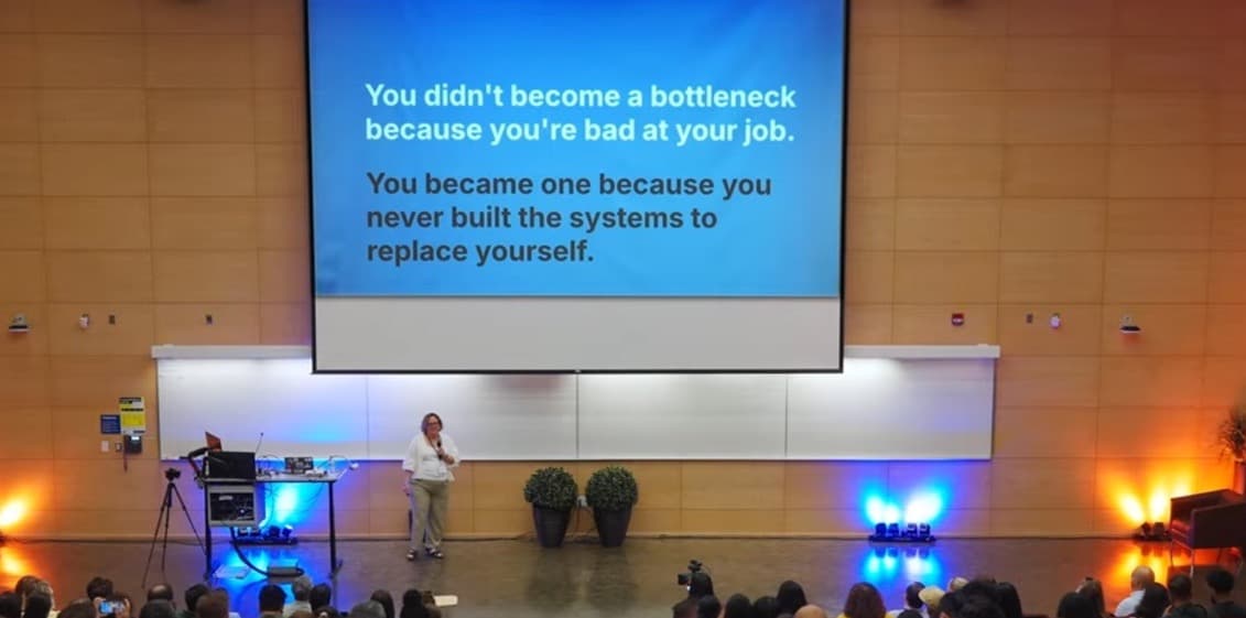Andrea Michalek speaking to an audience at Toronto Product Management Association’s ProductCon annual conference